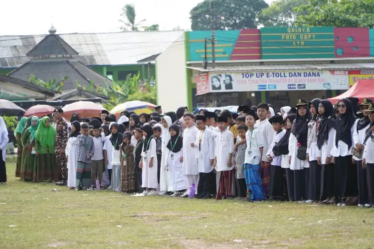 Pj Bupati Firsada Membacakan Sambutan Menteri Agama RI Pada Peringatan Hari Santri Tahun 2024